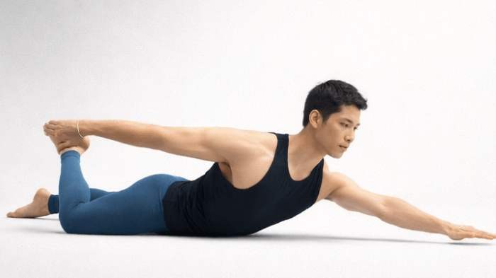 スコーピオンのポーズを取る男性